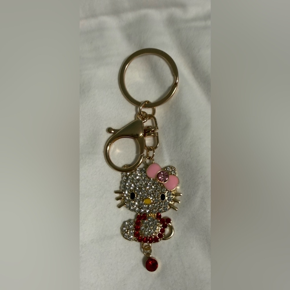 Bag-charm/Keyring Kitty with Pink Bow red and purple accents in gold tone! ❤️